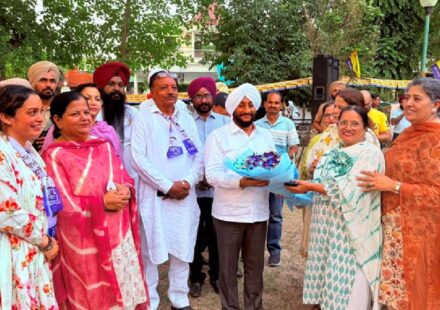 MLA Kulwant Singh interacting with residents during the Aap Di Sarkar Aap Da MC campaign in support of Rajinder Prasad Sharma in Ward 2, Mohali.