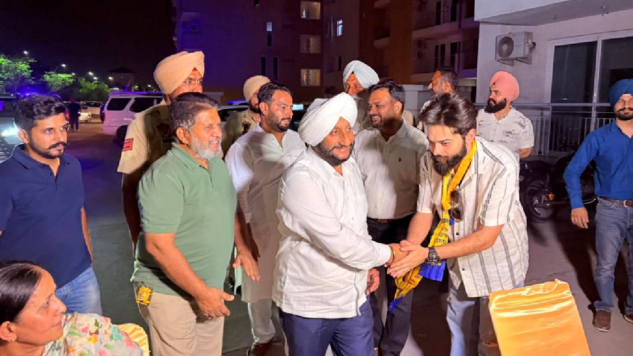 MLA Kulwant Singh interacting with residents during an election campaign in support of Kritika Sharma at Wave Estate in Ward 41, Mohali.