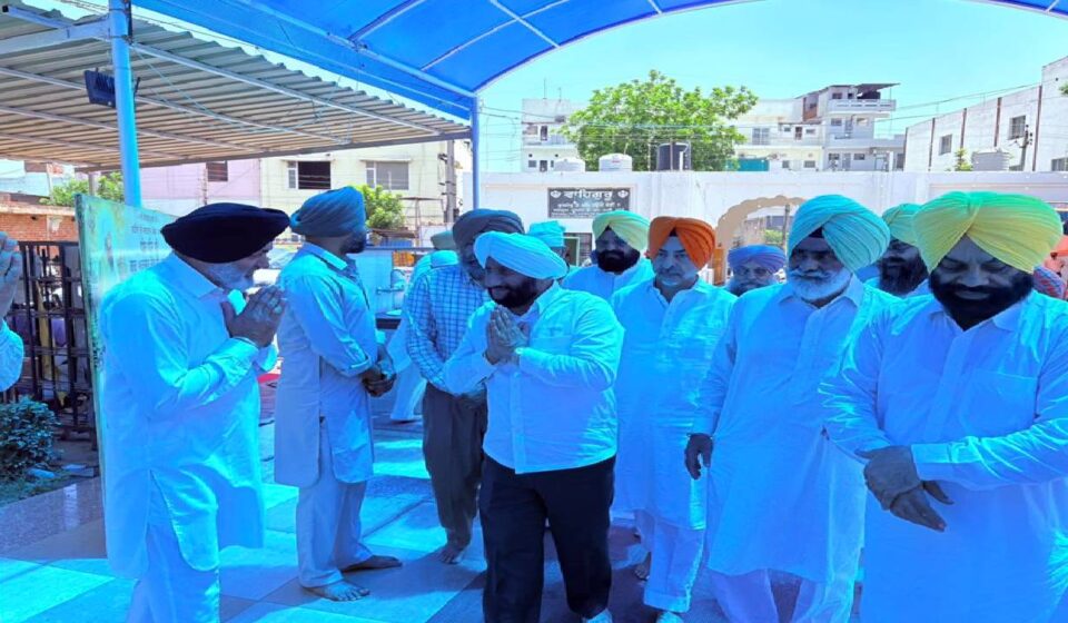 MLA Kulwant Singh attending a thanksgiving Path Sahib ceremony at Gurdwara Singh Shaheedan and congratulating Naseeb Singh Sandhu on his Ward 24 victory.