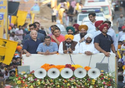 Chief Minister Bhagwant Mann, Arvind Kejriwal and MLA Kulwant Singh during the Thanksgiving Road Show in Mohali attended by a large gathering of residents
