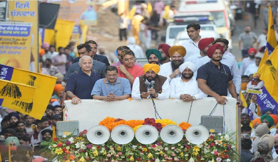 Chief Minister Bhagwant Mann, Arvind Kejriwal and MLA Kulwant Singh during the Thanksgiving Road Show in Mohali attended by a large gathering of residents