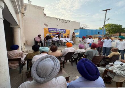 MLA Kulwant Singh interacting with residents during a community meeting in Manak Majra village, SAS Nagar Mohali, discussing development works and public welfare initiatives.