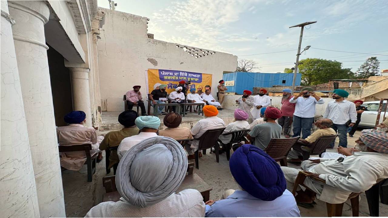 MLA Kulwant Singh interacting with residents during a community meeting in Manak Majra village, SAS Nagar Mohali, discussing development works and public welfare initiatives.