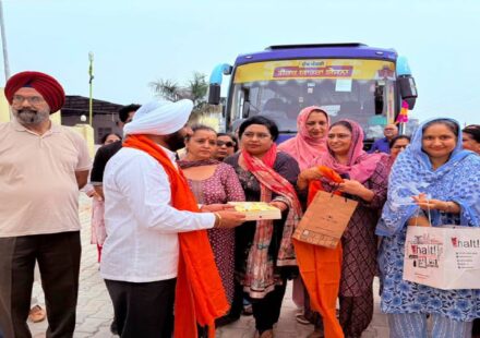 MLA Kulwant Singh greets senior citizens before the departure of the pilgrimage bus from Ansal API, Sector 114, Mohali