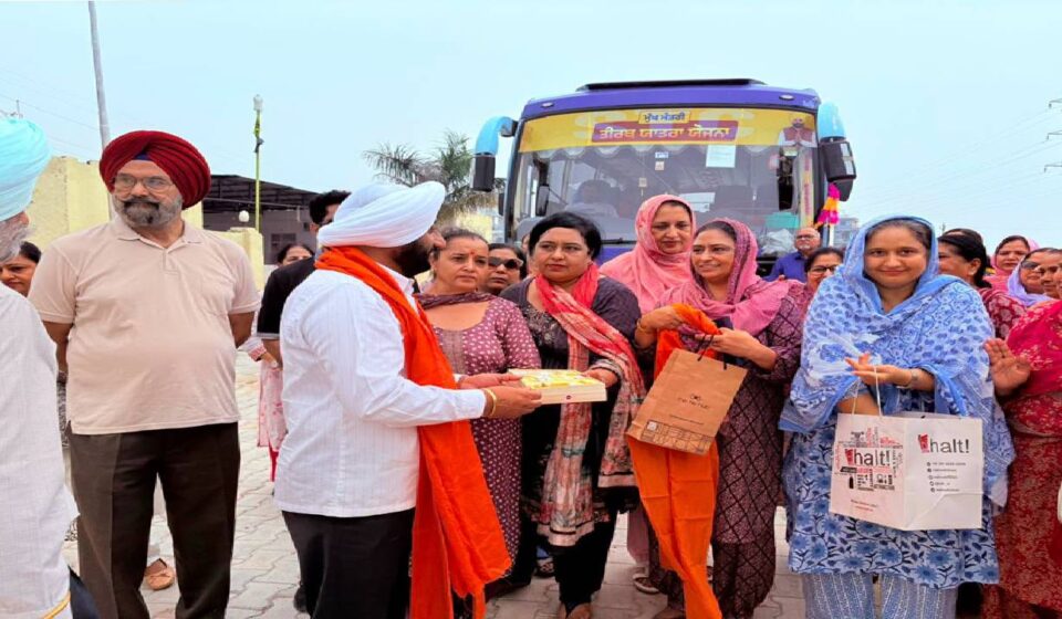MLA Kulwant Singh greets senior citizens before the departure of the pilgrimage bus from Ansal API, Sector 114, Mohali
