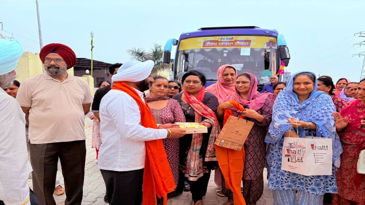 MLA Kulwant Singh greets senior citizens before the departure of the pilgrimage bus from Ansal API, Sector 114, Mohali