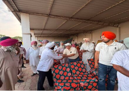 MLA Kulwant Singh interacting with residents during a community meeting in Bahrampur village, SAS Nagar Mohali, discussing development works and public welfare initiatives.