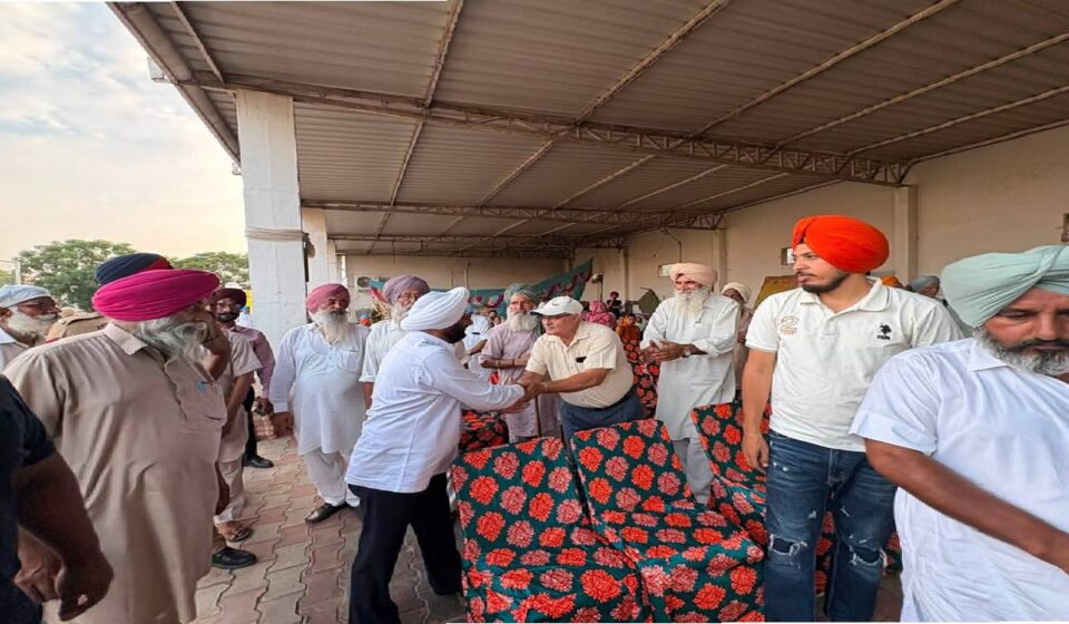 MLA Kulwant Singh interacting with residents during a community meeting in Bahrampur village, SAS Nagar Mohali, discussing development works and public welfare initiatives