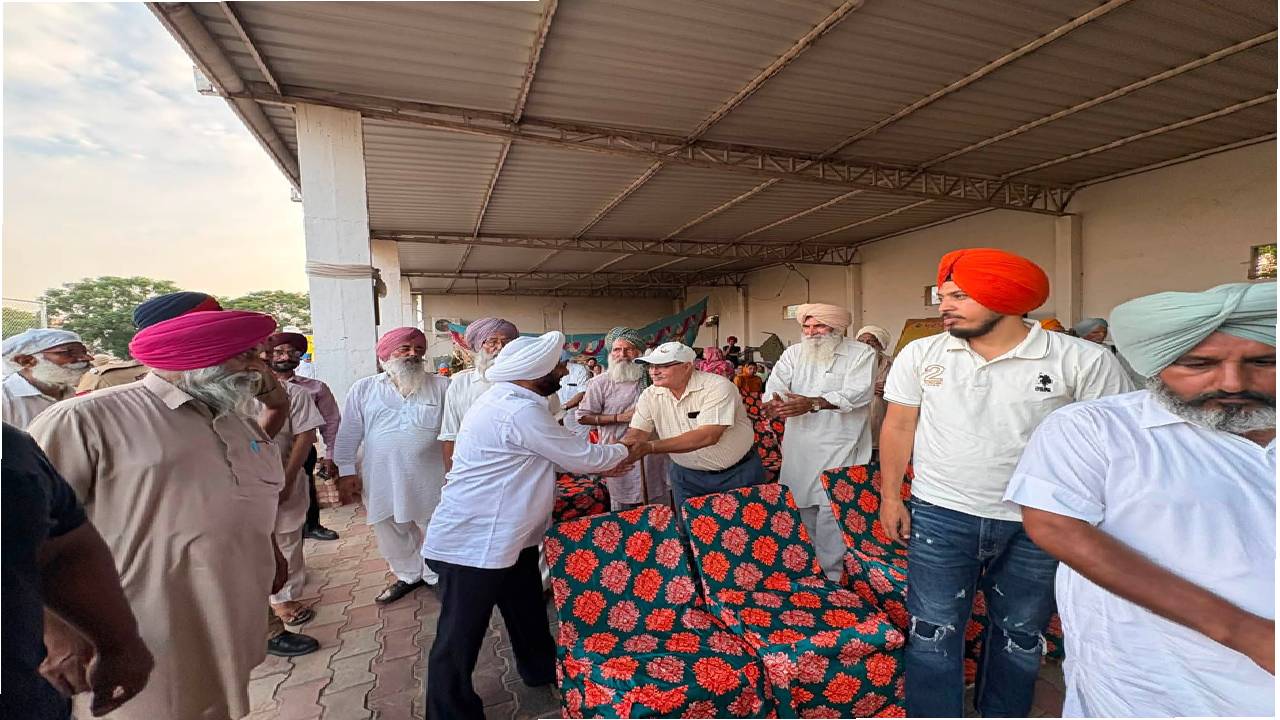 MLA Kulwant Singh interacting with residents during a community meeting in Bahrampur village, SAS Nagar Mohali, discussing development works and public welfare initiatives