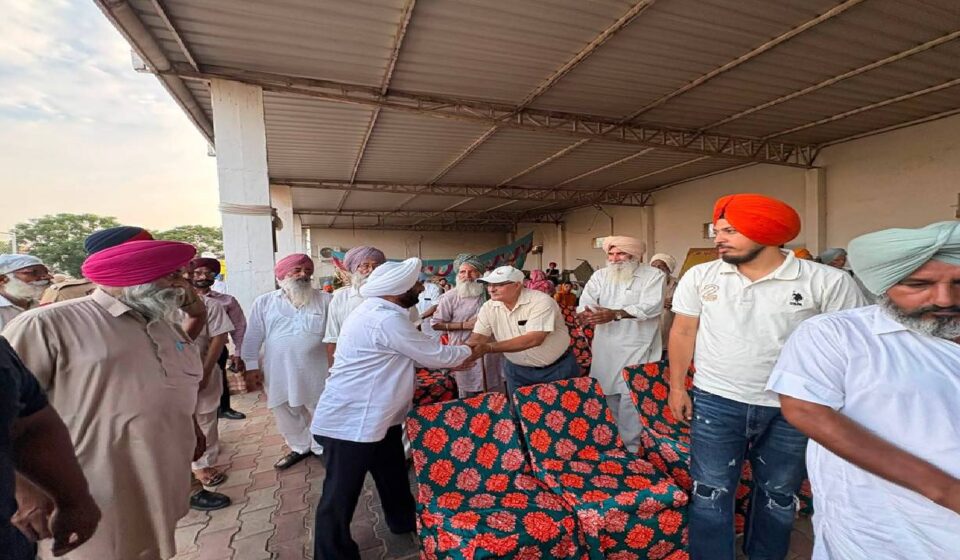 MLA Kulwant Singh interacting with residents during a community meeting in Bahrampur village, SAS Nagar Mohali, discussing development works and public welfare initiatives