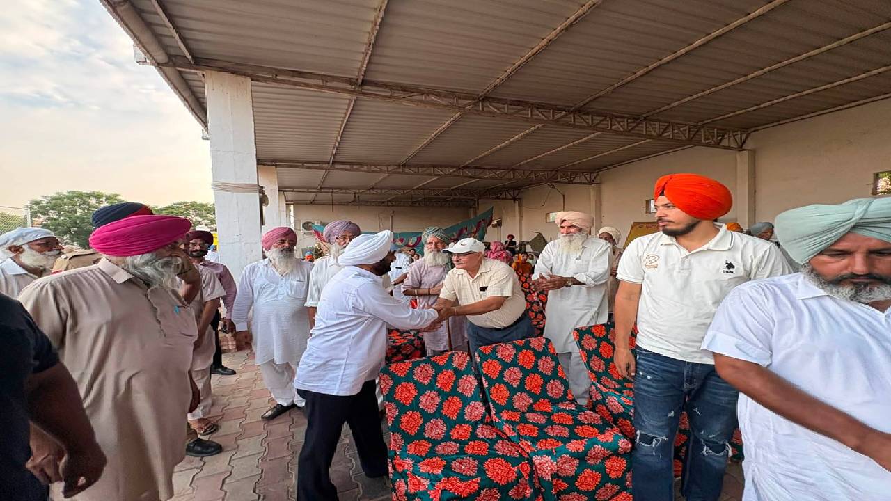 MLA Kulwant Singh interacting with residents during a community meeting in Bahrampur village, SAS Nagar Mohali, discussing development works and public welfare initiatives