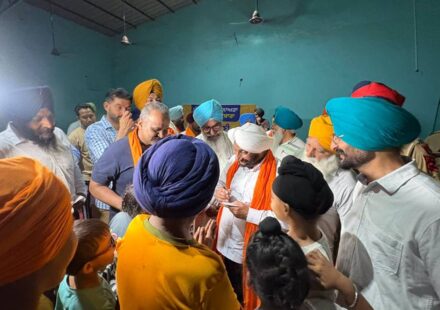 MLA Kulwant Singh interacting with residents of Bhagomajra village, SAS Nagar Mohali, during a community meeting on local development and public welfare.