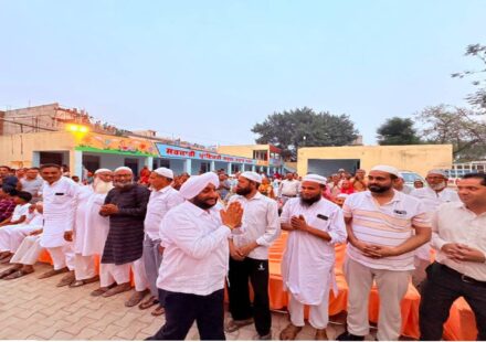 MLA Kulwant Singh interacting with residents during a community meeting in Jujhar Nagar, SAS Nagar Mohali, highlighting development initiatives and screening a documentary on Sri Guru Ravidas Ji.