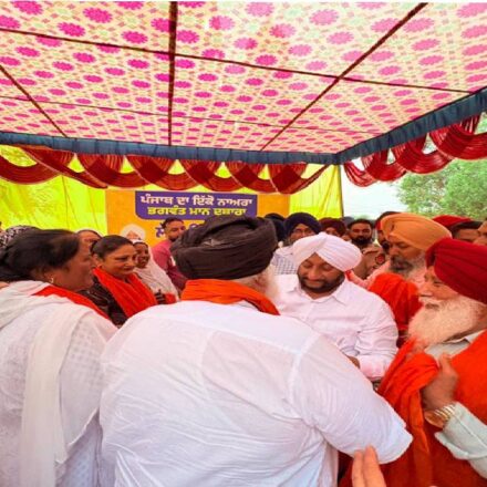 MLA Kulwant Singh interacting with residents during a Lok Milni programme in Barmajra village, SAS Nagar Mohali, and screening a documentary on Sri Guru Ravidas Ji.