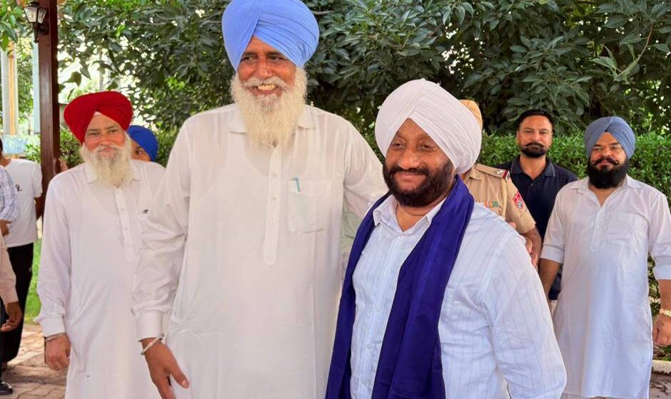 MLA Kulwant Singh addressing villagers during the Lok Milni programme at Chao Majra village in Mohali