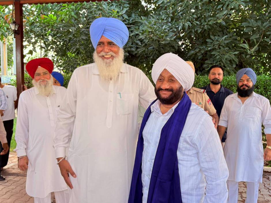 MLA Kulwant Singh addressing villagers during the Lok Milni programme at Chao Majra village in Mohali