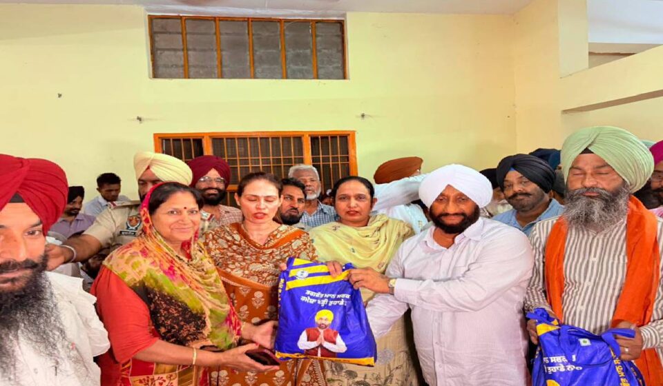 MLA Kulwant Singh distributes ration kits to needy families during the Lok Milni programme at Mataur village in Mohali