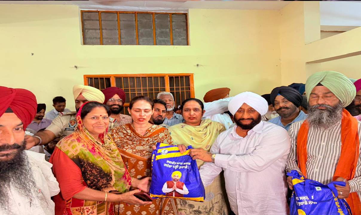 MLA Kulwant Singh distributes ration kits to needy families during the Lok Milni programme at Mataur village in Mohali