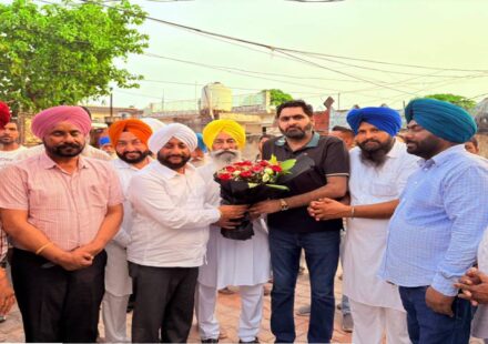 MLA Kulwant Singh interacting with residents during a Lok Milni programme in Raipur village, SAS Nagar Mohali, discussing development projects and public welfare initiatives