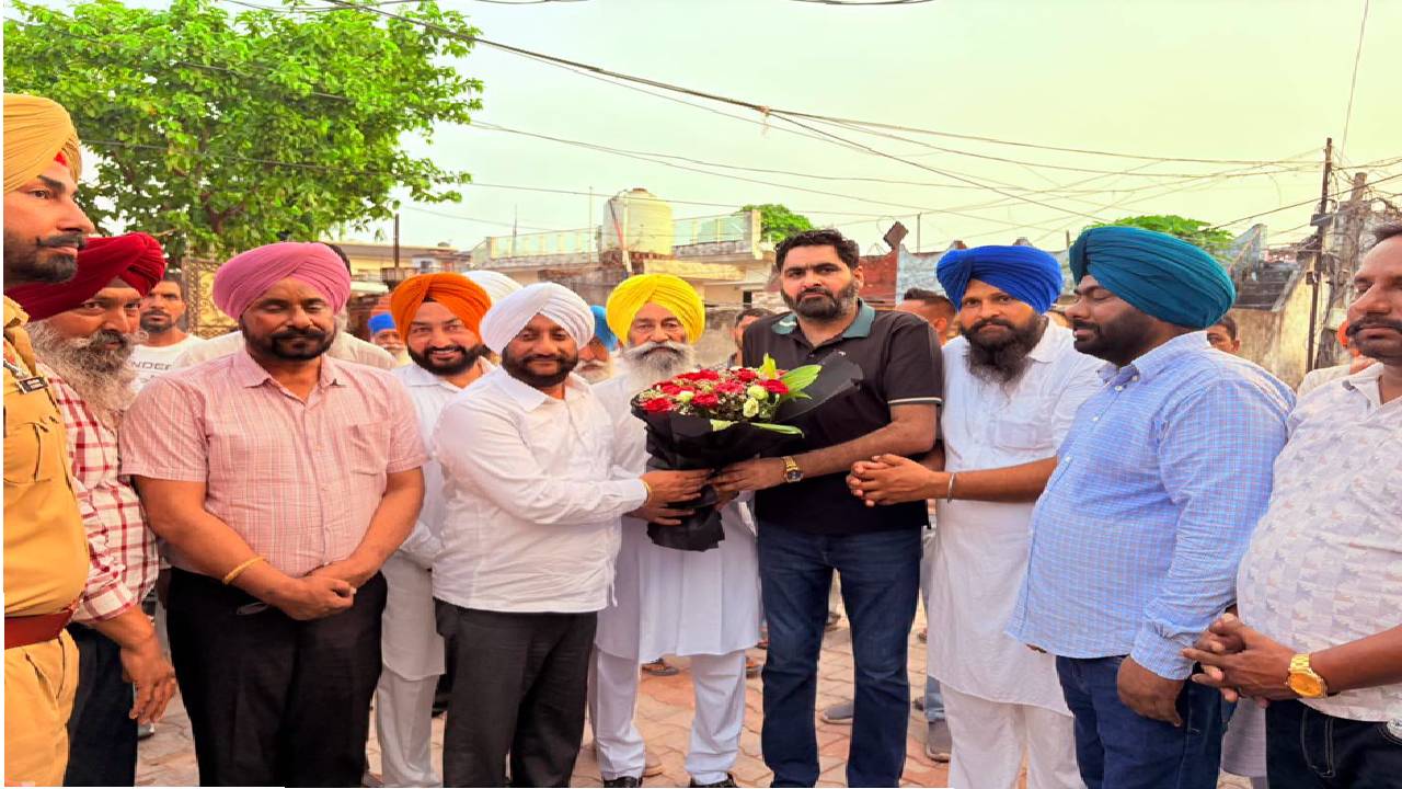 MLA Kulwant Singh interacting with residents during a Lok Milni programme in Raipur village, SAS Nagar Mohali, discussing development projects and public welfare initiatives