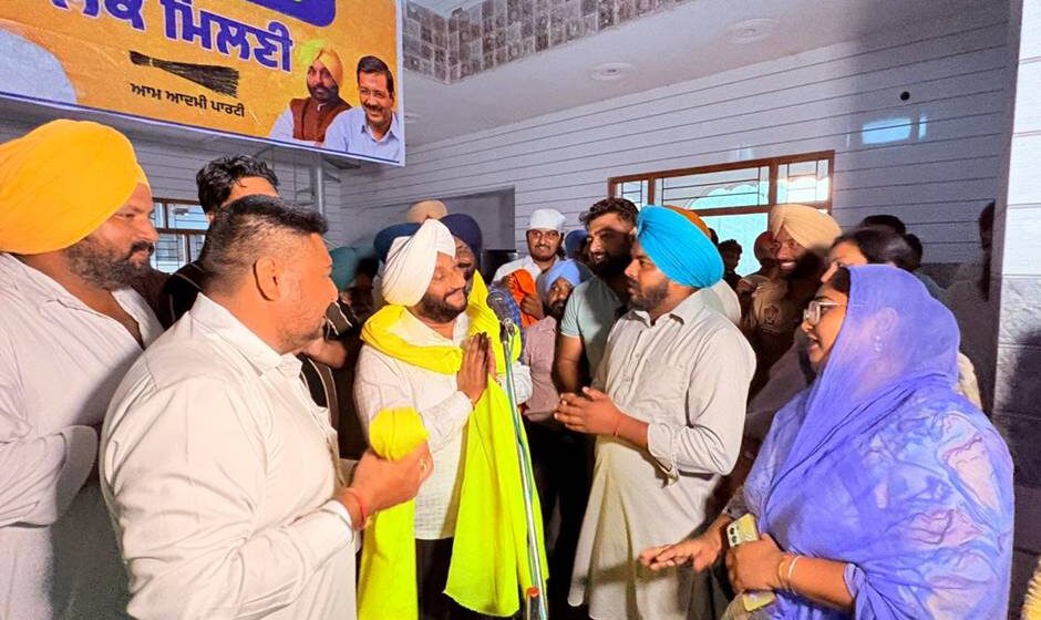 MLA Kulwant Singh interacting with villagers during a Lok Milni programme in Saidpur village, SAS Nagar Mohali, discussing public grievances and development initiatives.