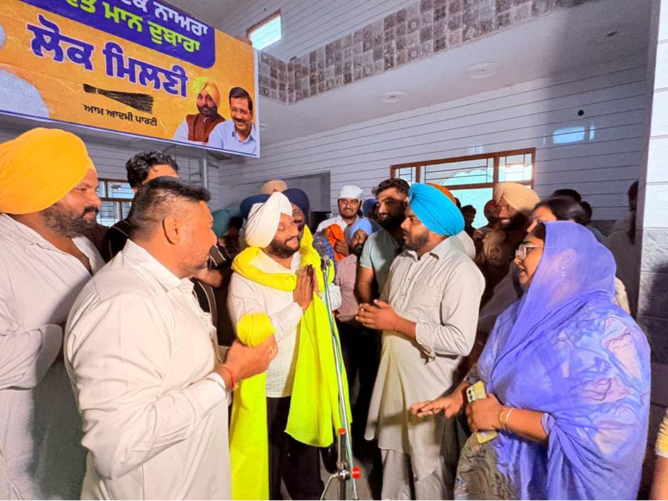 MLA Kulwant Singh interacting with villagers during a Lok Milni programme in Saidpur village, SAS Nagar Mohali, discussing public grievances and development initiatives.