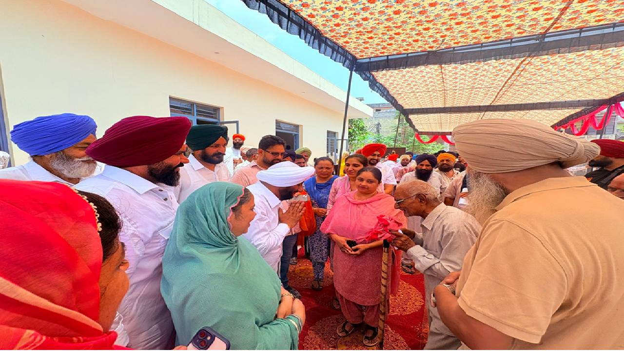 MLA Kulwant Singh interacting with residents during a Lok Milni programme in Sohana village, SAS Nagar Mohali, discussing public issues and village development.