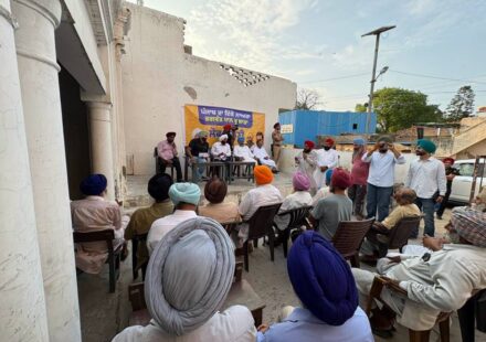 MLA Kulwant Singh interacting with residents during a community meeting in Manak Majra village, SAS Nagar Mohali, discussing development works and public welfare initiatives
