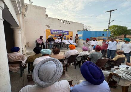 MLA Kulwant Singh interacting with residents during a community meeting in Manak Majra village, SAS Nagar Mohali, discussing development works and public welfare initiatives