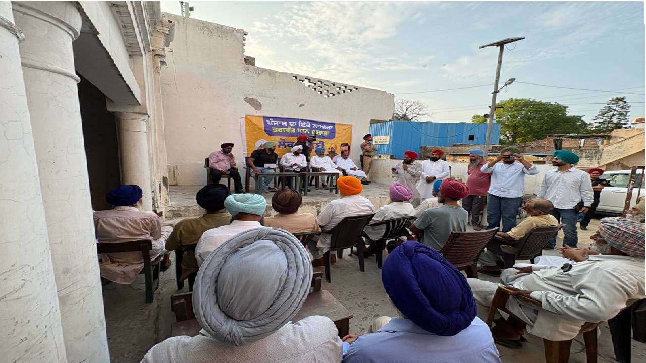 MLA Kulwant Singh interacting with residents during a community meeting in Manak Majra village, SAS Nagar Mohali, discussing development works and public welfare initiatives