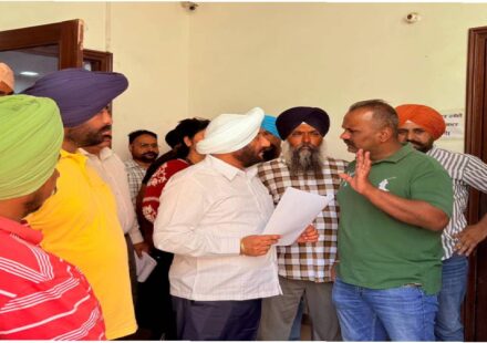 MLA Kulwant Singh interacting with residents during a public grievance meeting in SAS Nagar Mohali, listening to local issues and assuring timely action