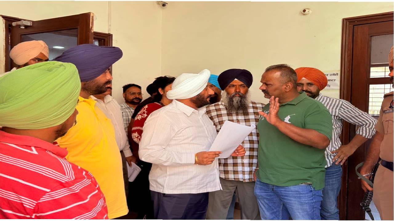 MLA Kulwant Singh interacting with residents during a public grievance meeting in SAS Nagar Mohali, listening to local issues and assuring timely action