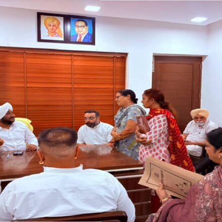 MLA Kulwant Singh interacting with residents at his constituency office in SAS Nagar Mohali, listening to public grievances and discussing local issues
