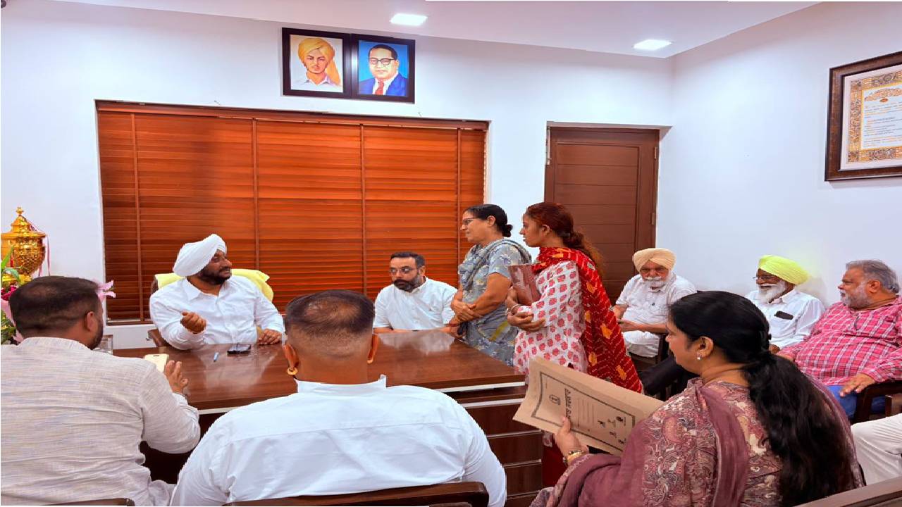 MLA Kulwant Singh interacting with residents at his constituency office in SAS Nagar Mohali, listening to public grievances and discussing local issues