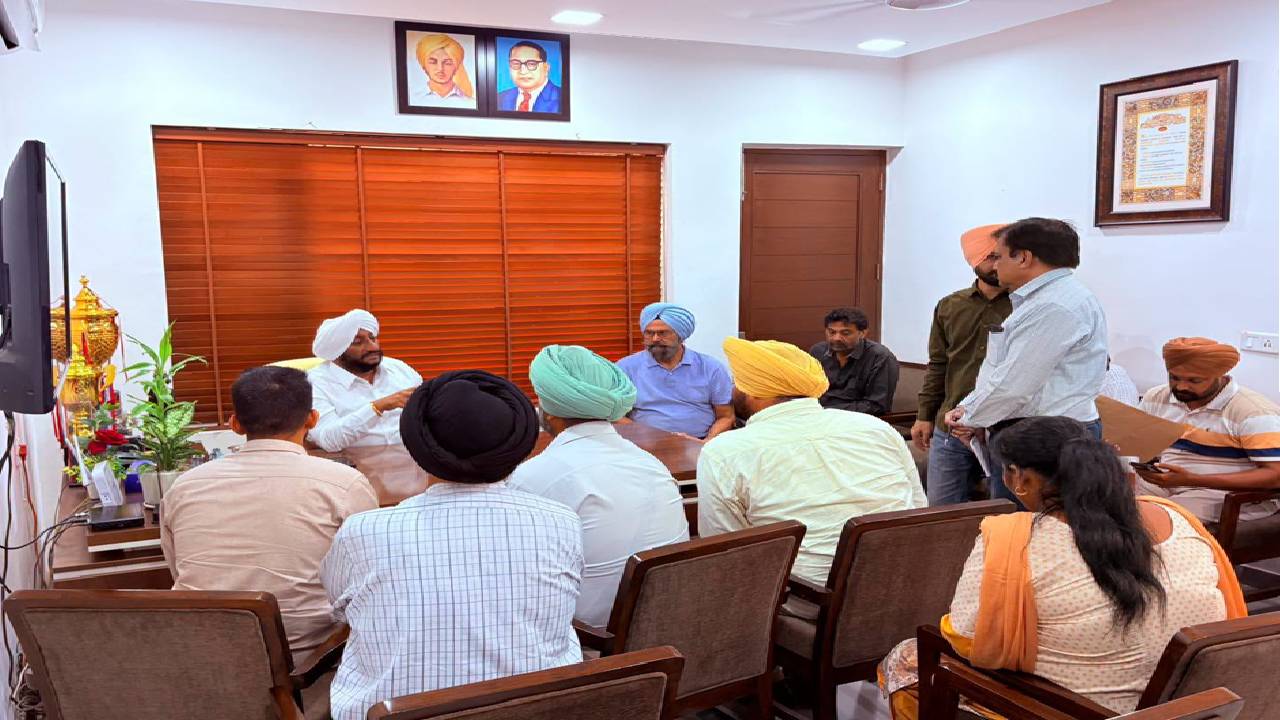 MLA Kulwant Singh interacting with residents at his constituency office in SAS Nagar Mohali, listening to public grievances and discussing local issues