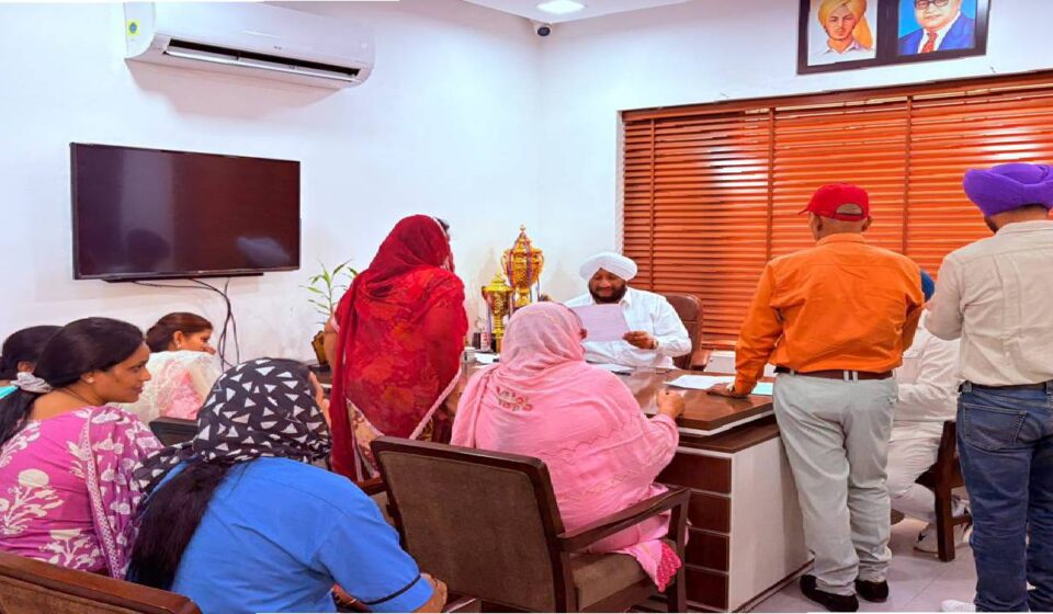 MLA Kulwant Singh interacting with residents during a public grievance meeting in SAS Nagar Mohali to hear local concerns and assure timely action