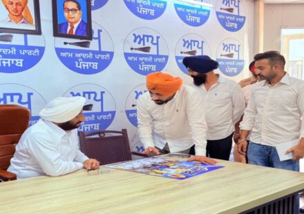 MLA Kulwant Singh interacting with residents during a public grievance meeting at his constituency office in Mohali