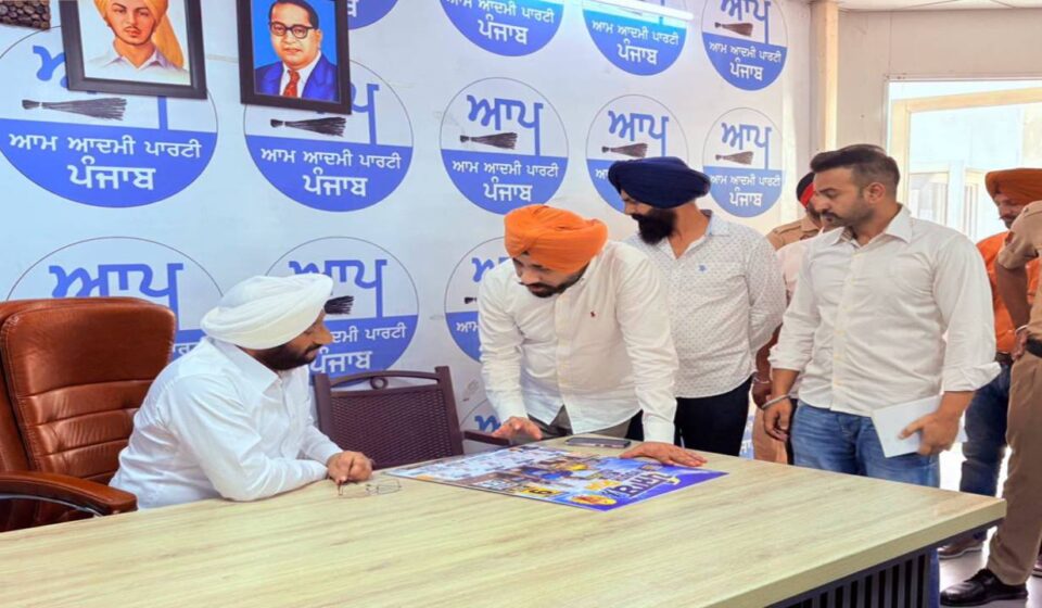 MLA Kulwant Singh interacting with residents during a public grievance meeting at his constituency office in Mohali