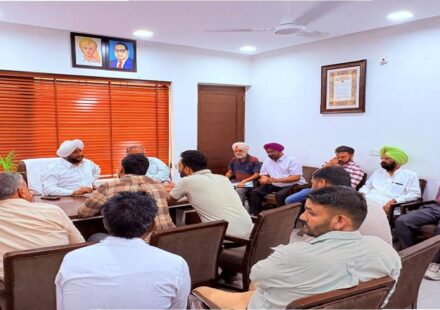 MLA Kulwant Singh interacting with residents during a public grievance meeting in Mohali focused on citizen services and local development issues.