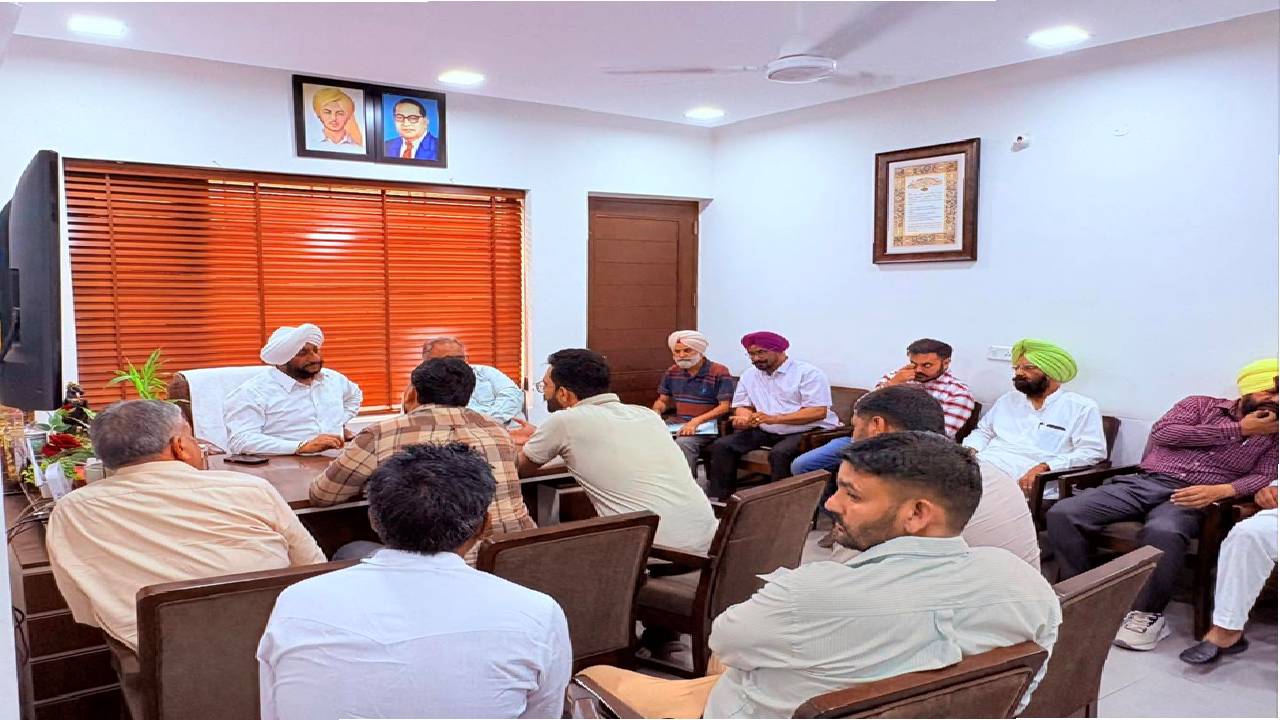 MLA Kulwant Singh interacting with residents during a public grievance meeting in Mohali focused on citizen services and local development issues.