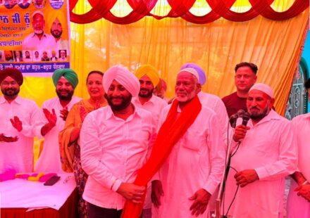 MLA Kulwant Singh congratulating Sodagar Khan during a thanksgiving ceremony following his appointment as Chairman of the Punjab State Muslim Development Board in Mohali.