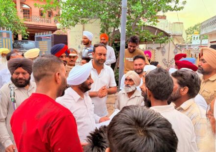 MLA Kulwant Singh interacting with residents during a community meeting in Sukhgarh village, SAS Nagar Mohali, discussing development projects and public welfare initiatives.