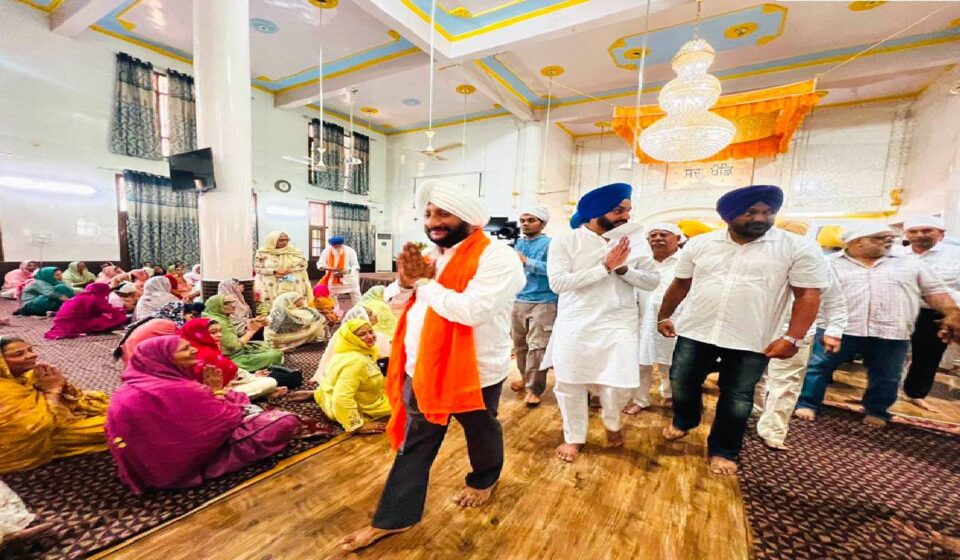 MLA Kulwant Singh attending the Sri Sukhmani Sahib Path at Gurdwara Singh Sabha in Phase 11, SAS Nagar Mohali, with Bibi Opinderpreet Kaur and her family
