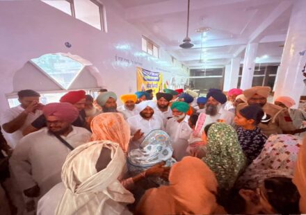 MLA Kulwant Singh interacting with residents during a public meeting in Tangori village, SAS Nagar Mohali, discussing development projects and public welfare initiatives