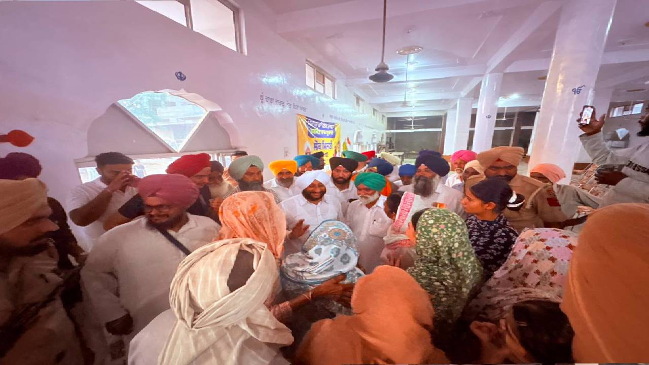 MLA Kulwant Singh interacting with residents during a public meeting in Tangori village, SAS Nagar Mohali, discussing development projects and public welfare initiatives