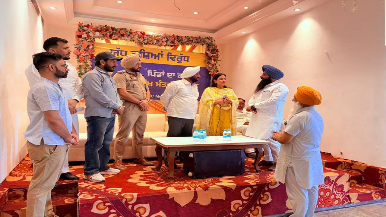 MLA Kulwant Singh distributing identity cards to War Against Drugs volunteers during a meeting in SAS Nagar Mohali to strengthen the anti-drug awareness campaign