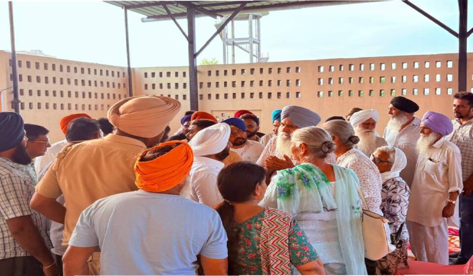 MLA Kulwant Singh interacting with residents during a Lok Milni meeting in Kalon village, SAS Nagar Mohali, discussing local issues and Punjab Government development initiatives