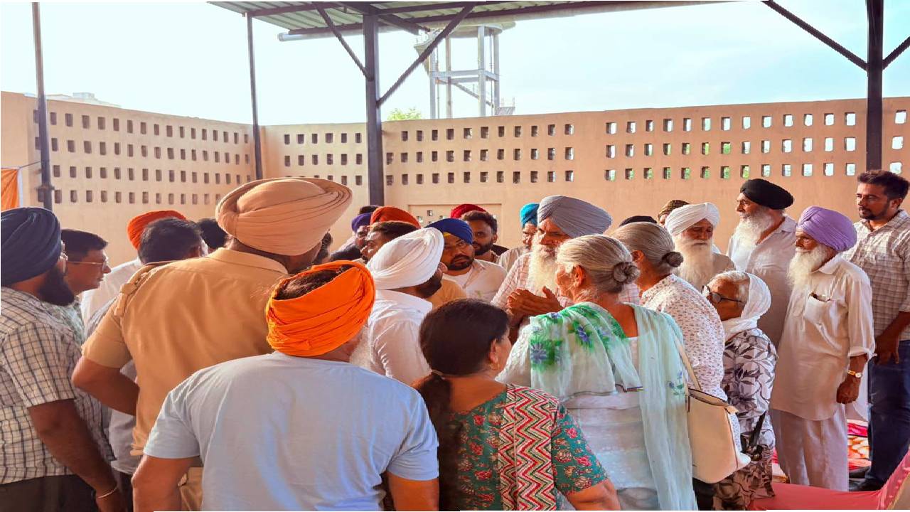MLA Kulwant Singh interacting with residents during a Lok Milni meeting in Kalon village, SAS Nagar Mohali, discussing local issues and Punjab Government development initiatives