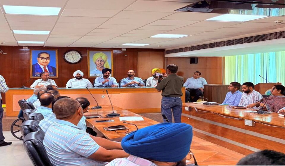Mayor Sarabjeet Singh Samana chairs a development review meeting with Municipal Corporation officials and councillors in SAS Nagar Mohali.