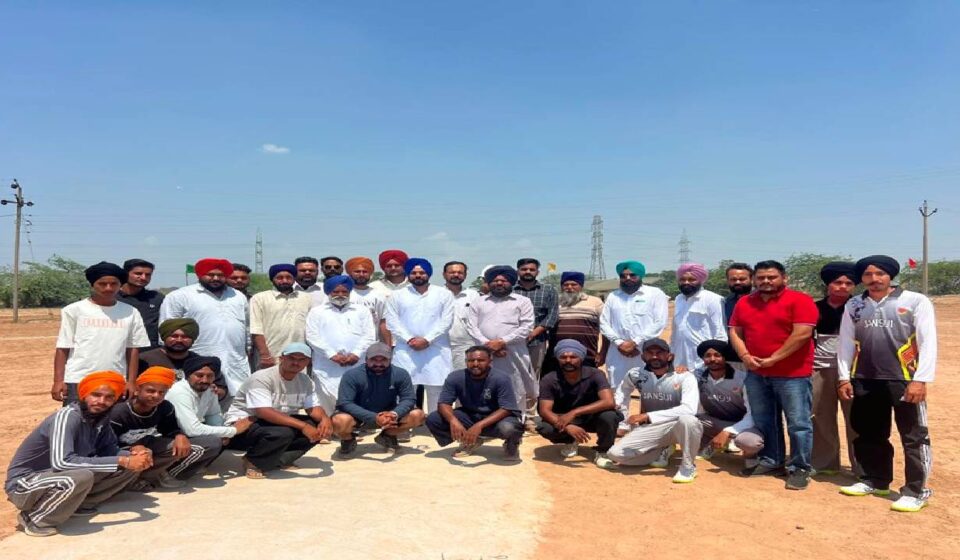 Mayor Sarabjeet Singh Samana encourages young cricketers and team managers during the cricket tournament organised by Shaheed Udham Singh Youth Club at Village Tangori, Mohali.
